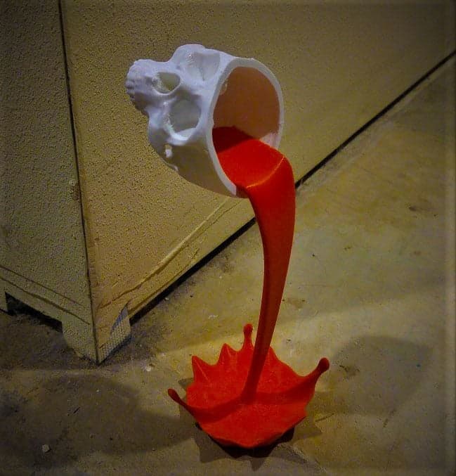 Floating, spilling skull